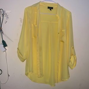 Translucent long sleeve button down.